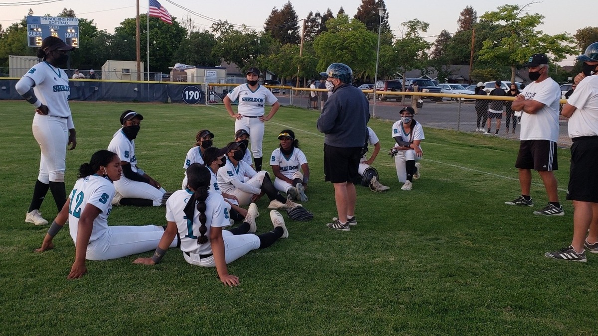 Sheldon High School softball coach Mary Jo Truesdale talks to her team after beating Elk Grove 3-2 on Thursday, April 15, 2021.