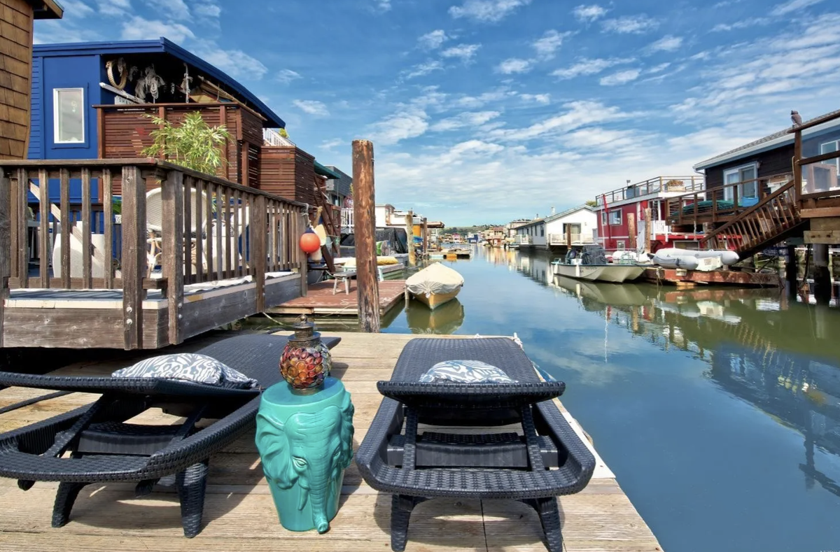 A deck provides water views.