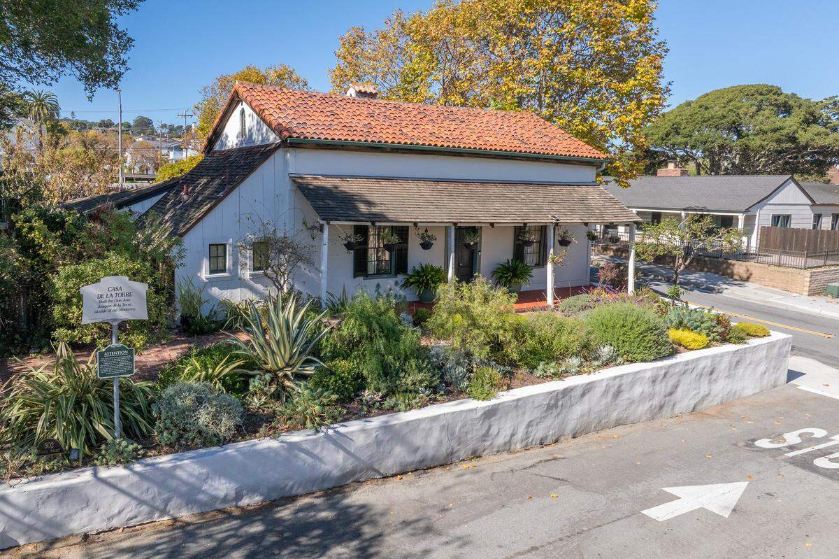 Casa de la Torre includes a main house with 1 bedroom, 1 bath, and a loft, as well as a detached guest quarters, combining for 2,245 square feet of living space.