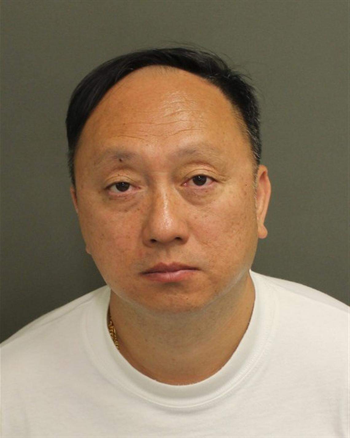 Kenneth Chee is pictured in a mugshot.