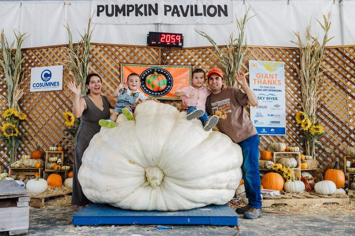Ruben Frias celebrates alongside his family after winning the 2024 Giant Pumpkin Weigh-Off at the Elk Grove Giant Pumpkin Festival. This year’s two-day event kicks off Saturday at Elk Grove Park.