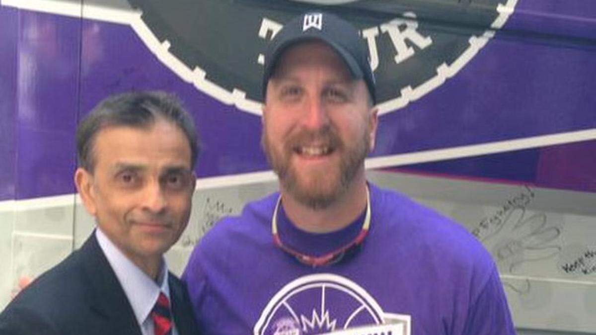 Sacramento sports radio personality David Weiglein, right, poses with Kings owner Vivek Ranadive. Known as "Carmichael Dave," Weiglein opposes Ranadive's deal to temporarily relocate the Oakland Athletics to Sacramento.