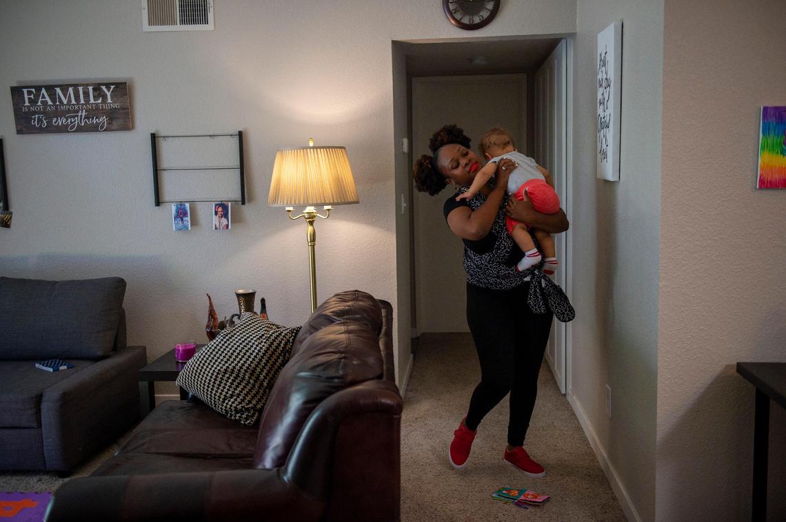 Racquel A. Payton says she struggles to pay for daycare for her son Yahir, 1, Tuesday, Aug. 20, 2019, in Sacramento. The single mom earns $50,000 a year as a preschool teacher at Sacramento City Unified, but she still struggles to afford child care for her infant son, especially as her rent approaches $2,000 a month.