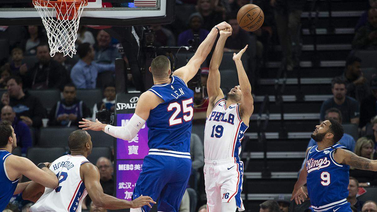 Sacramento Kings center Alex Len (25) knocks the ball from Philadelphia 76ers guard Raul Neto (19) during a game at the Golden 1 Center on Thursday, March 5, 2020 in Sacramento.