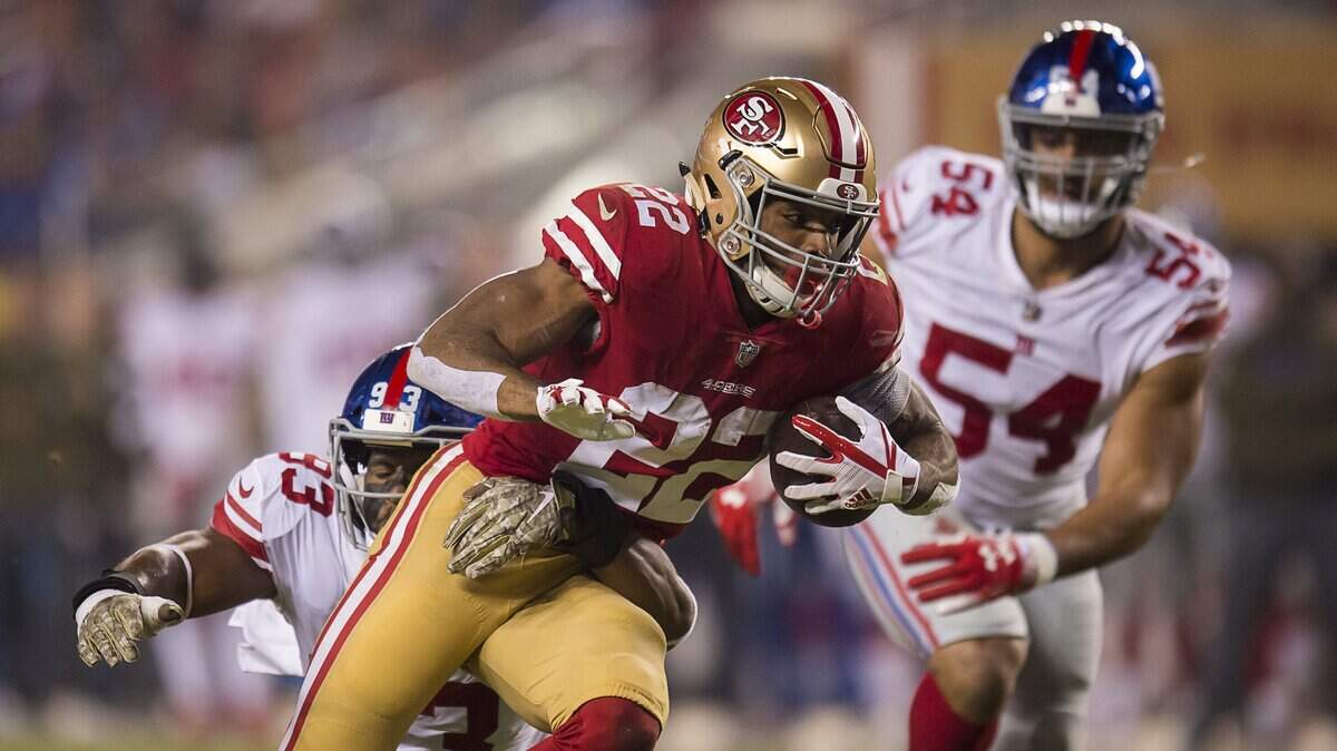 49ers running back Matt Breida (22) tries to run past New York Giants middle linebacker B.J. Goodson (93) in the second quarter at Levi’s Stadium on Monday, Nov. 12, 2018 in Santa Clara. San Francisco lost to the Giants 27-23.