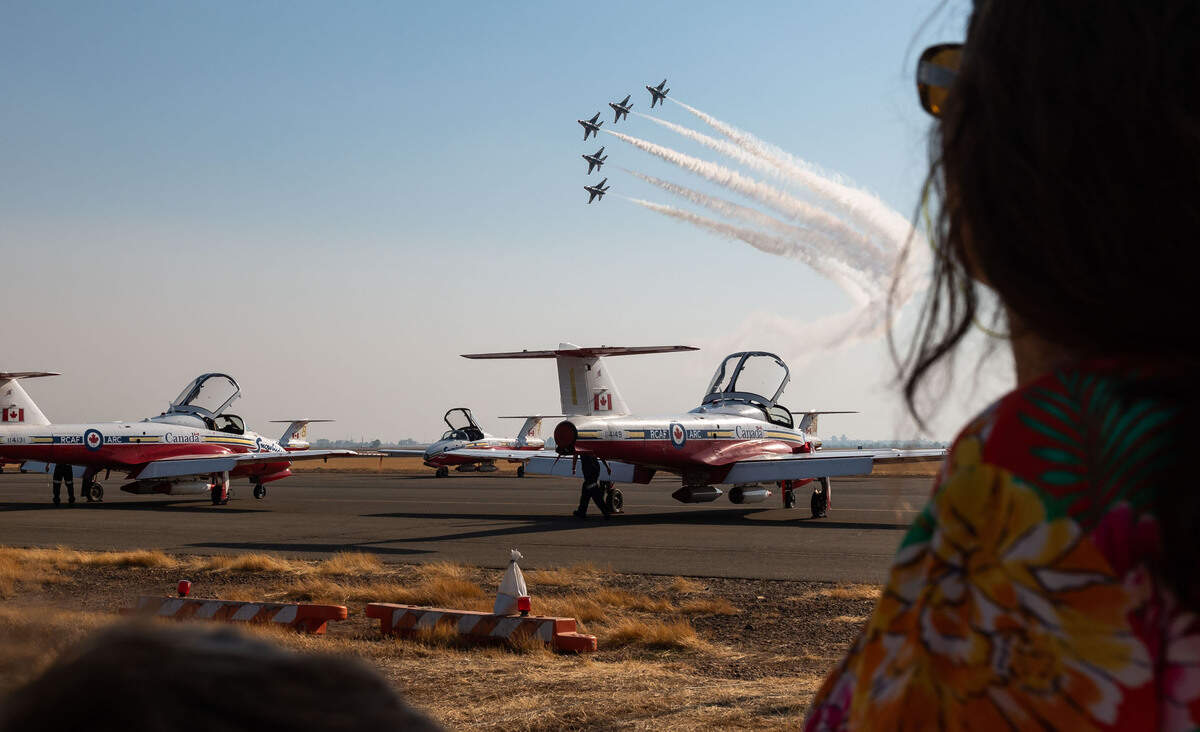 F-16 Fighting Falcon jets with the U.S. Air Force Air Demonstration Squadron “Thunderbirds” fly over the Royal Canadian Air Force “Snowbirds,” performing over the weekend, at the California Capital Airshow on Friday, Sept. 24, 2021, at Mather Airport in Sacramento.
