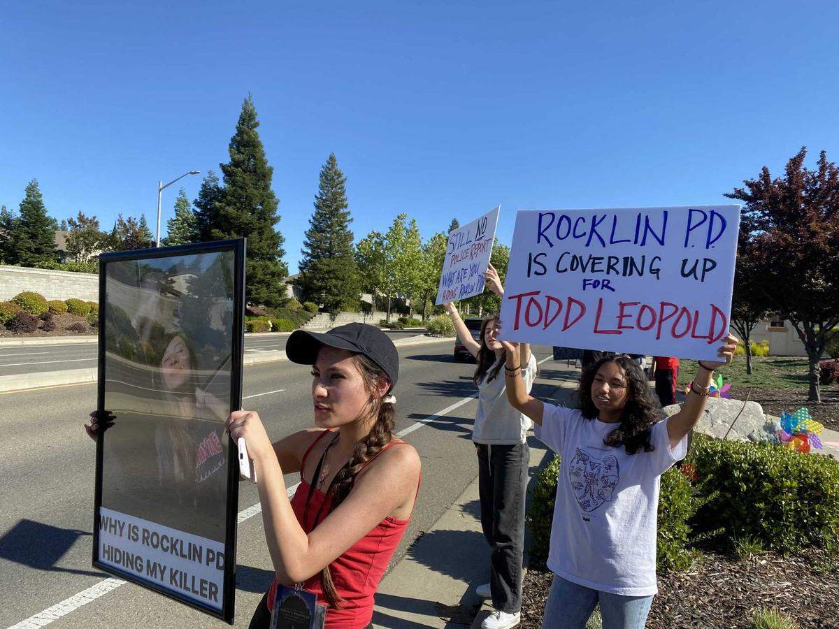 Cameron Angulo (front) participates in a protest on May 13, 2022, not far from where a vehicle driven by Placer County CEO Todd Leopold fatally struck her boyfriend, Anthony Williams, on March 19, 2022, on Lonetree Boulevard in Rocklin, California.