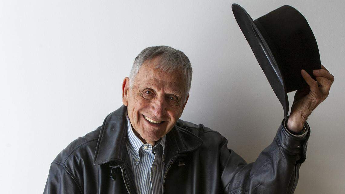 Gregory Kondos tips his hat at his show titled “A Touch of Blue” at the Crocker Art Museum as he approached his 90th birthday in 2013. The renowned painter died Friday, March 26, 2021, in Sacramento at the age of 97.