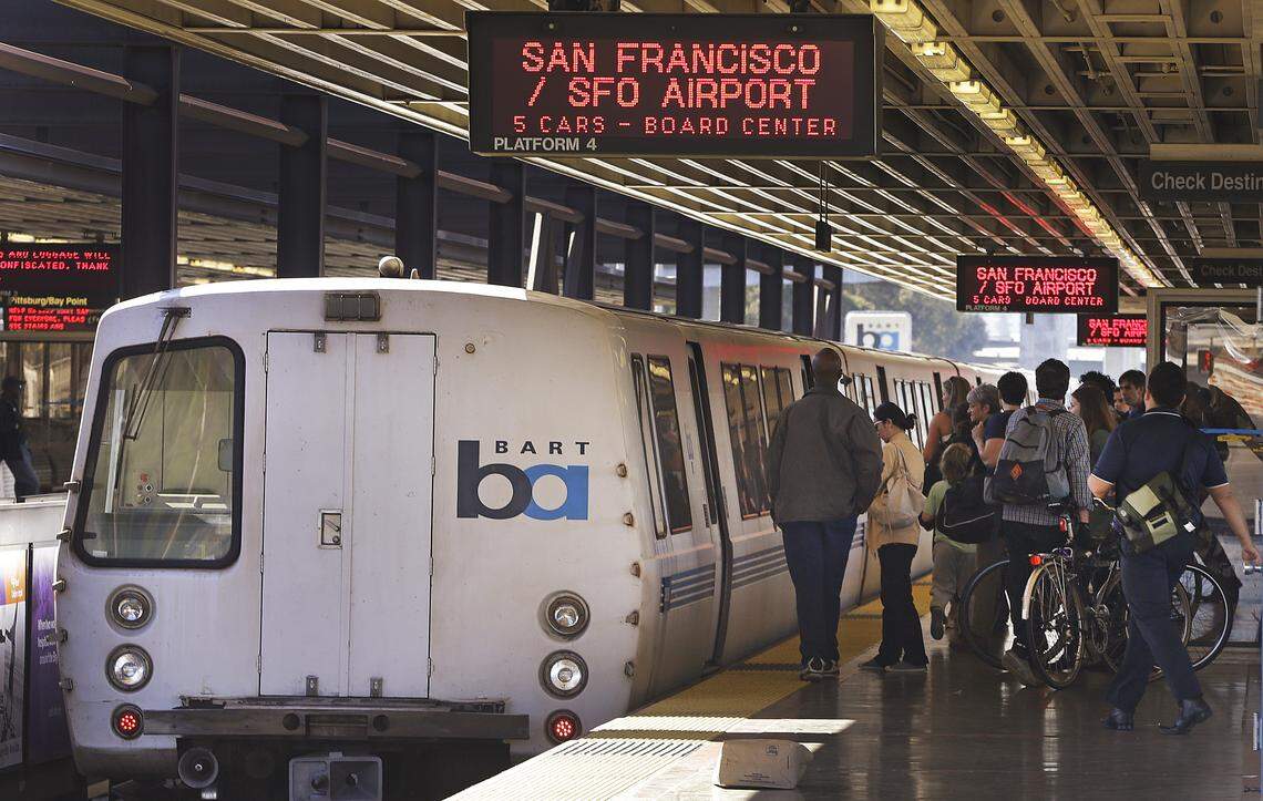 In this Oct. 15, 2013, file photo, passengers board a Bay Area Rapid Transit train in Oakland. BART is one of several public transit agencies that claims it’s in need of more state money to stay afloat.