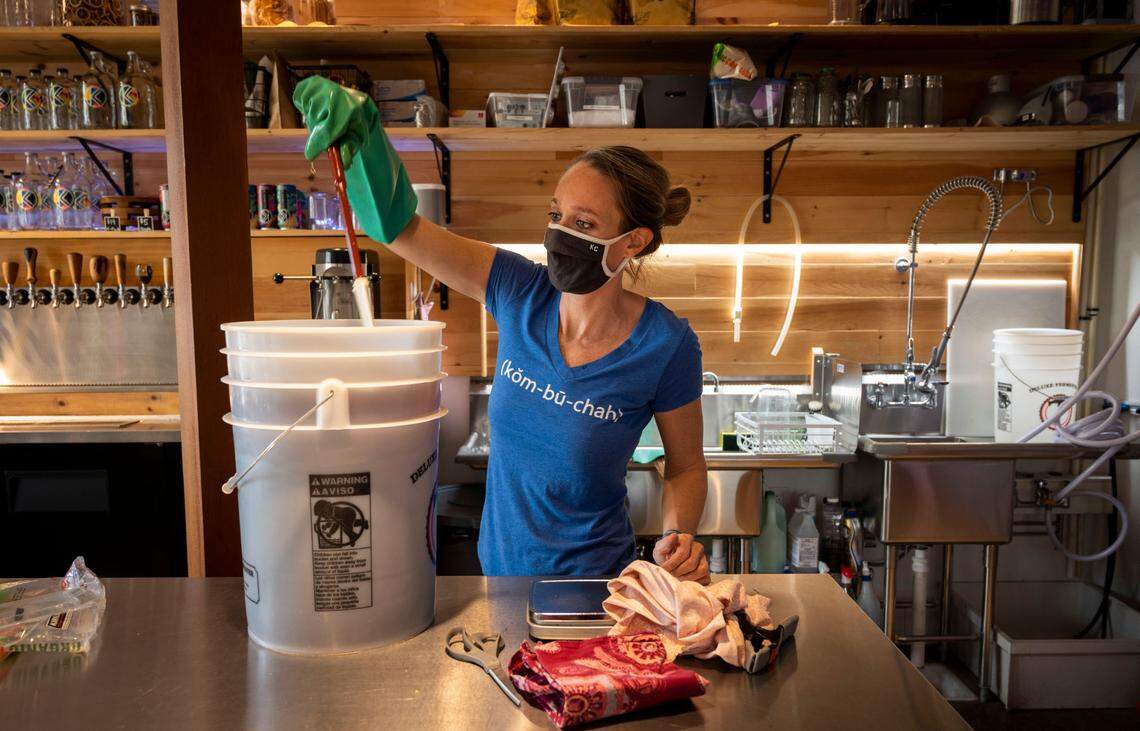 Courtney Edwards brews a batch of kombucha at KC Kombucha in North Oak Park on Friday, Nov. 5.