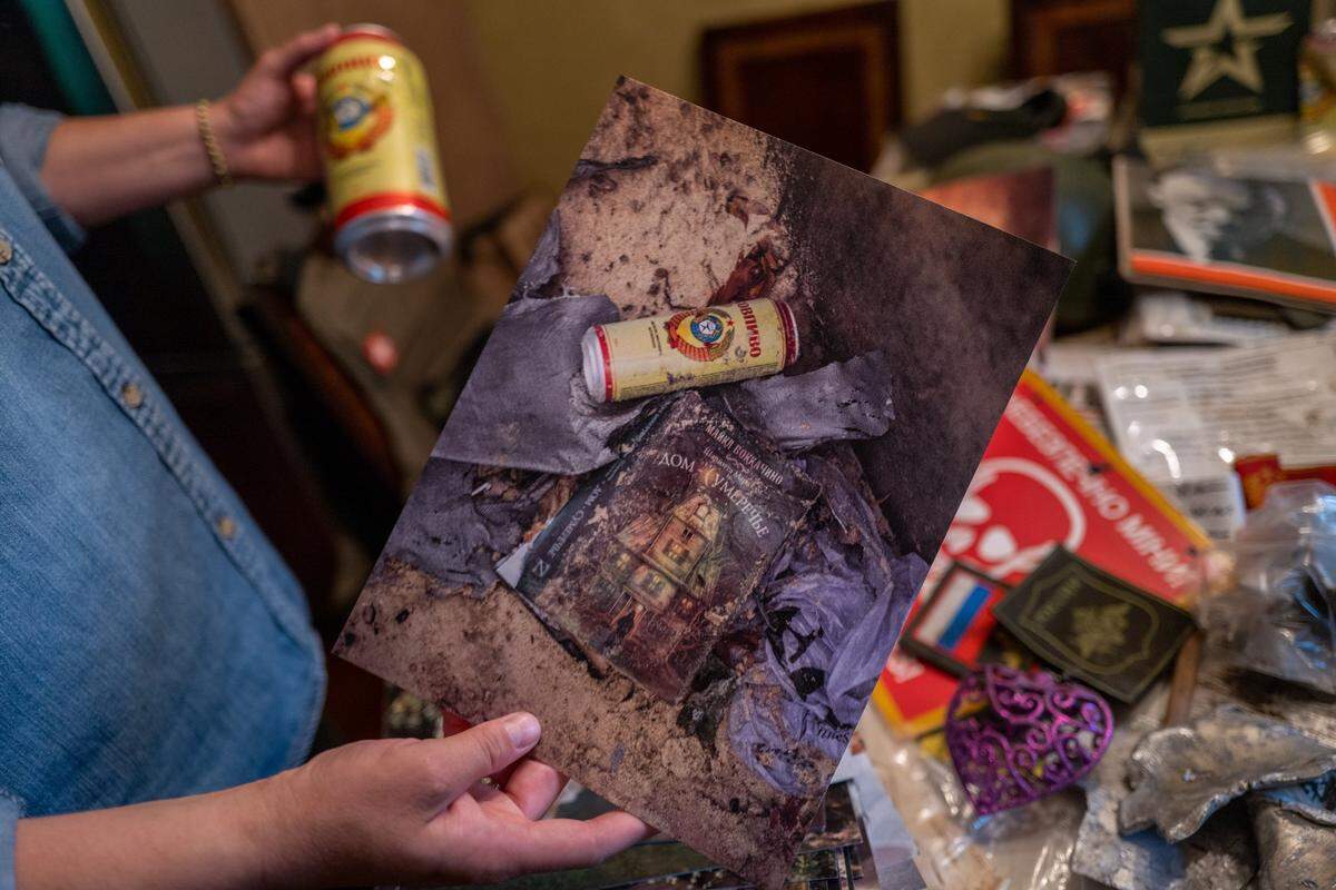 Alina Tyulyu holds a beer can on Tuesday that she says was left by Russian soldiers, and her photograph documenting it from the year she spent in the country that started in March 2022. “These images start at the Polish Ukrainian border then I take you on a journey pretty much thorough all of Ukraine,” she said. “We go from the Polish-Ukrainian border to Lviv to Kyiv and all the way to Eastern border.”