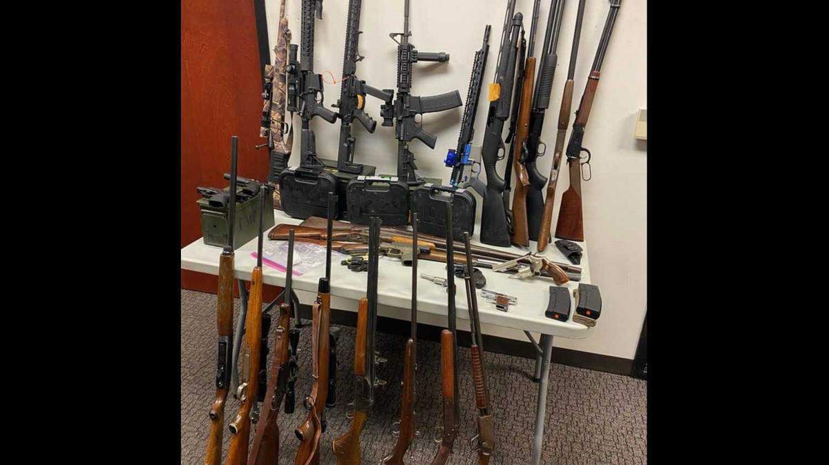 The Davis Police Department recovered more than dozen weapons, including assault guns and non-serialized guns, after executing a search warrant in Woodland.