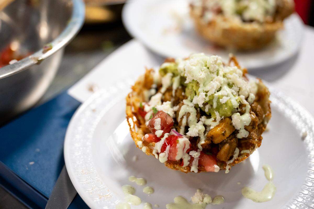 Isabelle Nasah and her mother, Andrea Nasah, created a burrito in a potato bowl entry awarded first place in the California Junior Chef Cooking Challenge at the California State Fair on Tuesday, July 22, 2025, in Sacramento.