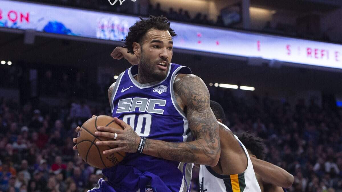 Kings center Willie Cauley-Stein (00) secures a defensive rebound against the Utah Jazz on Sunday night, Nov. 25, at Golden 1 Center in Sacramento. The Kings were outrebounded 49-36 in their 133-112 loss to the Jazz.
