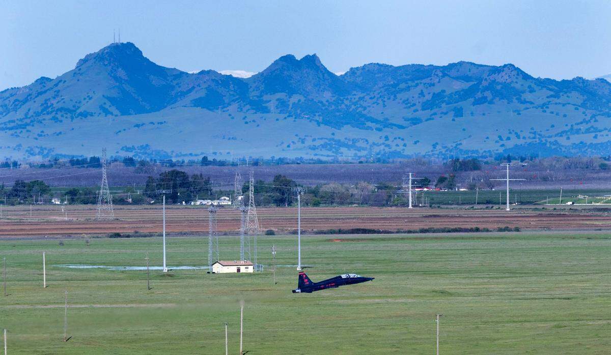 A T-38 Talon takes off with the Sutter Buttes in the background during at Beale Air Force Base on Wednesday, April 2, 2025.