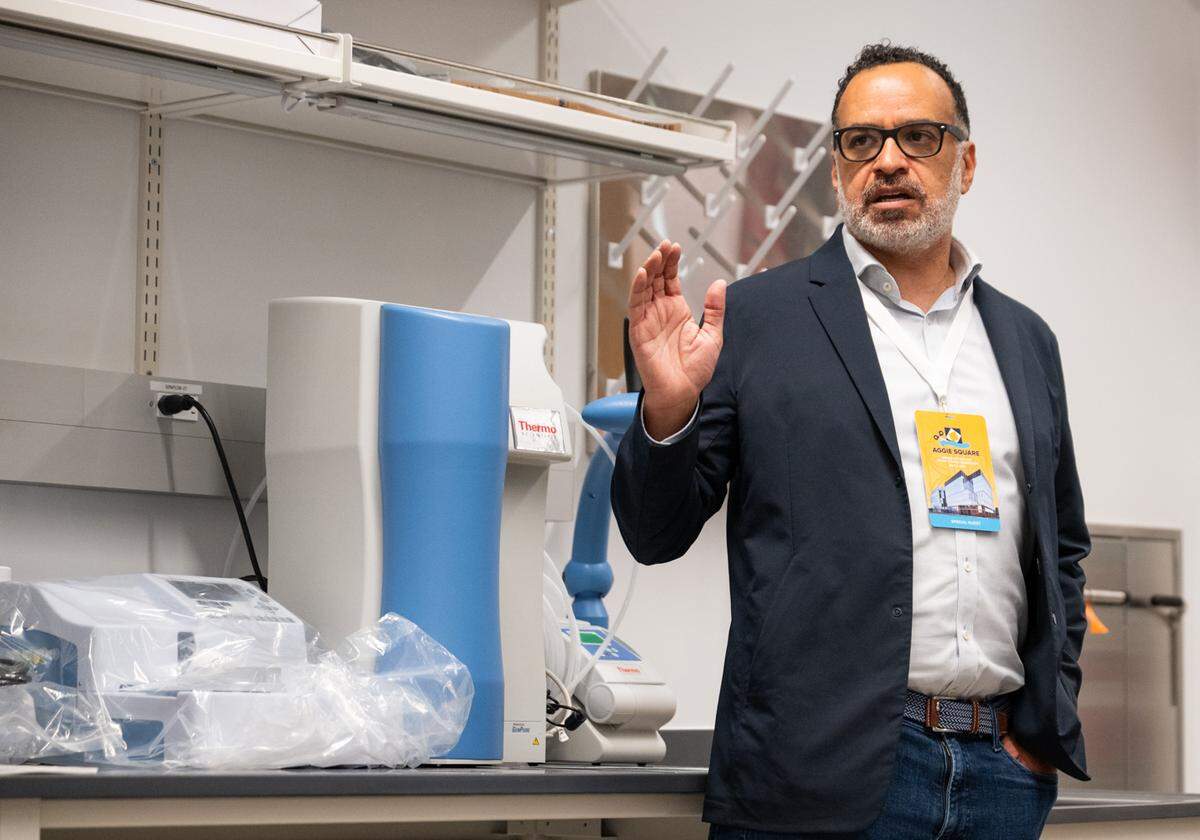 Wexford Connect Lab’s Travis Sheridan describes some of the shared lab equipment available to researchers who rent their lab space at Aggie Square in Sacramento on Friday.