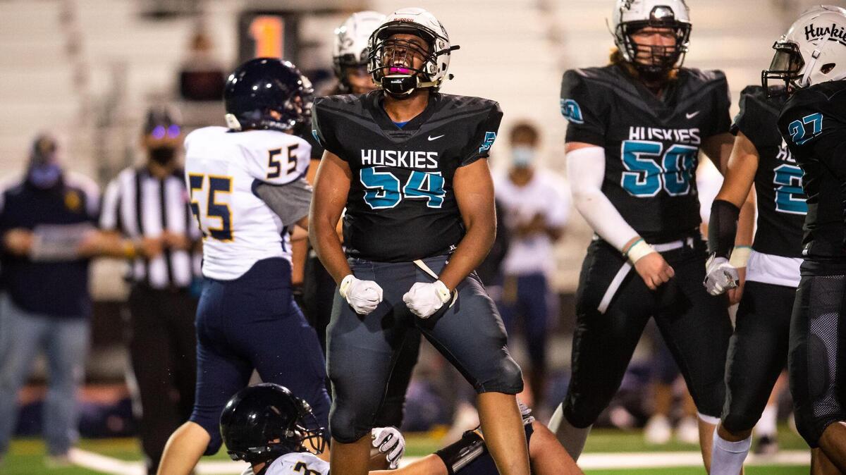 Sheldon’s Soibi Ross celebrates bringing down River City’s Jacob Medina in the backfield during the fourth quarter of the high school football game Thursday, April 8, 2021, at Sheldon High School in Sacramento County. Sheldon won 26-13.