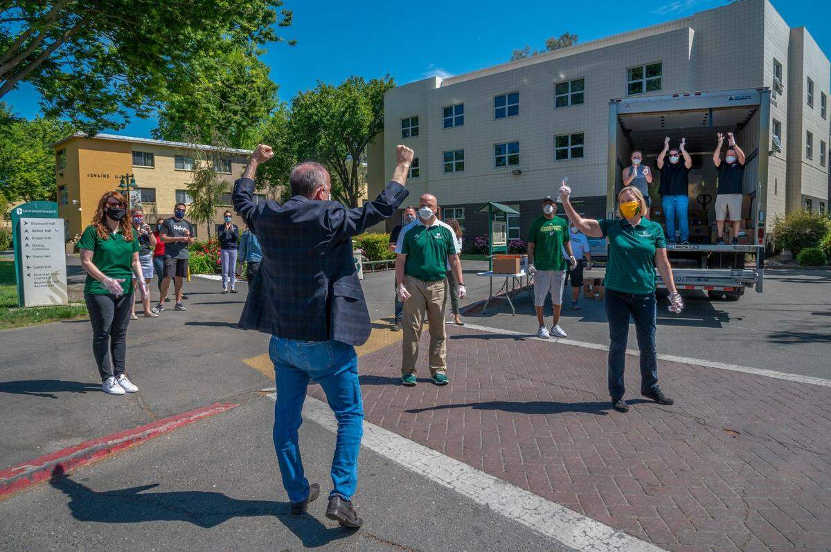 Mayor Darrell Steinberg arrives full of energy to help pass out meals to Sacramento State students on campus on April 30, 2020, during the coronavirus outbreak. “I miss being with people and that’s part of a mayor’s job description. So that’s a little bit different and it’s not the same having a community meeting on Zoom,” he said.