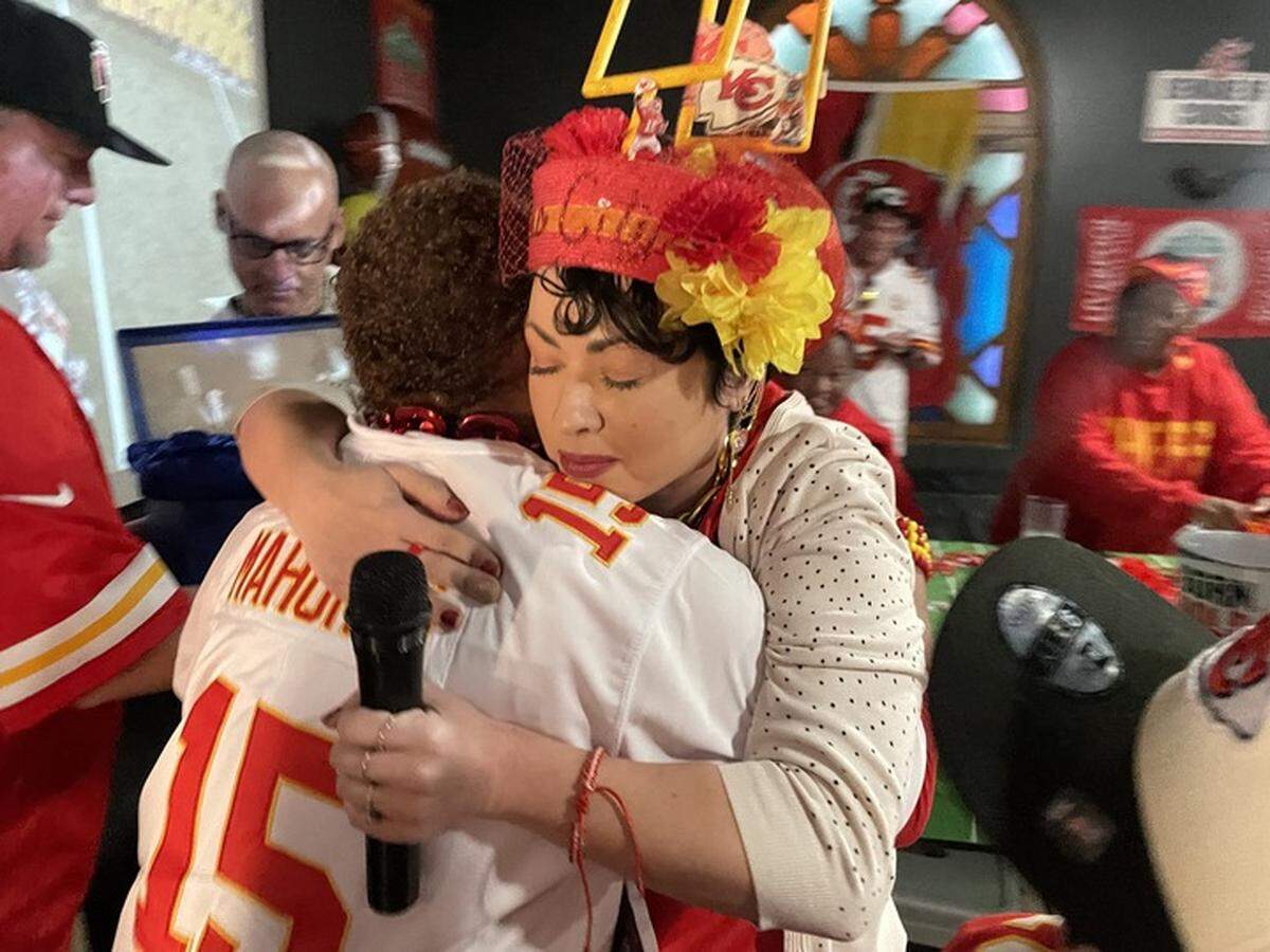 Theresa Gayner embraces Melissa Anthony during Sunday’s Super Bowl at Field House American Sports Pub in Arden Arcade.
