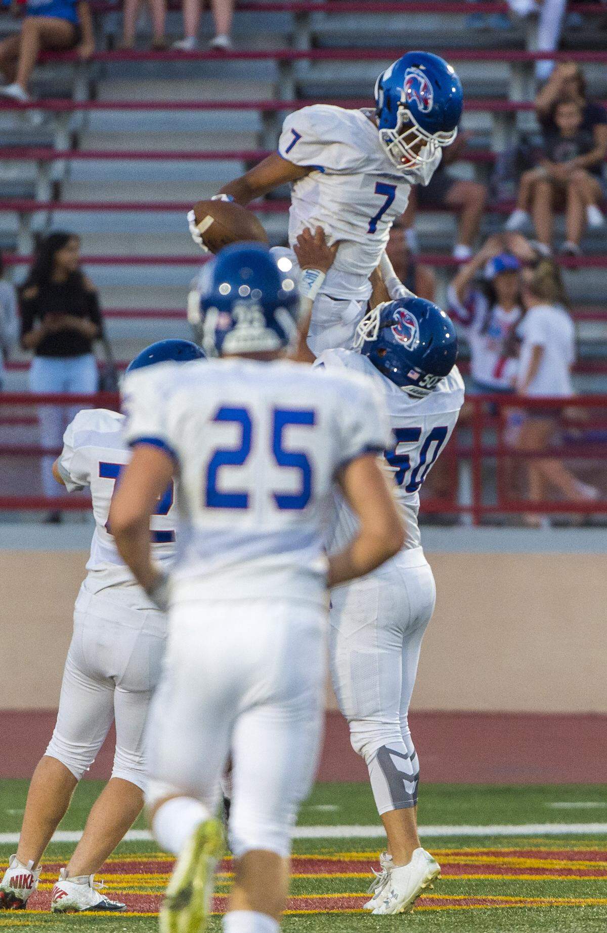 Christian Brothers’ Tyler Green (7) celebrates his touchdown, making the score 7-7 after the point after attempt was good, during the first quarter against Jesuit in the Holy Bowl at Hughes Stadium at Sacramento City College, Sept. 9, 2017.