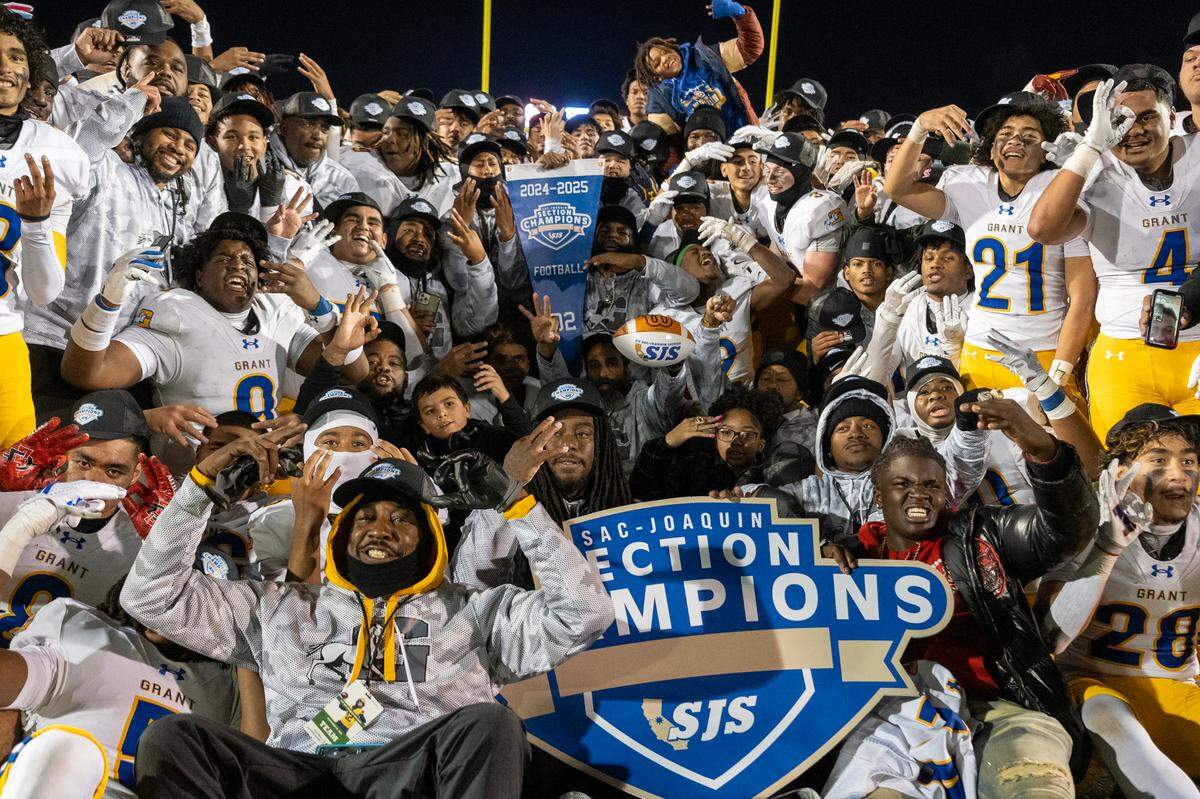 The Grant Pacers celebrate following their victory over the Rocklin Thunder on Friday in the Sac-Joaquin Section Division II championship on Friday at Hughes Stadium in Sacramento.
