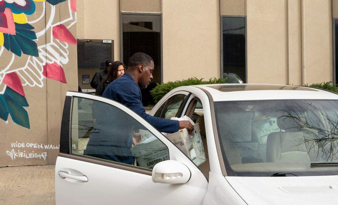 SEIU Local 1000 presdient Richard Louis Brown, who was suspended on Feb. 28., puts boxes in his car after he gained access to the SEIU building on Saturday after the locks had been changed. It was reported as a break-in and Sacramento police responded.