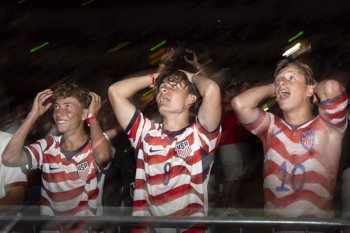United States react to a referee’s call during a watch party at Memorial Auditorium in Sacramento on Wednesday as the U.S. men's soccer team faced off against Bosnia and Herzegovina in the World Cup. The game, which the U.S. won 2-0, was played in Santa Clara.