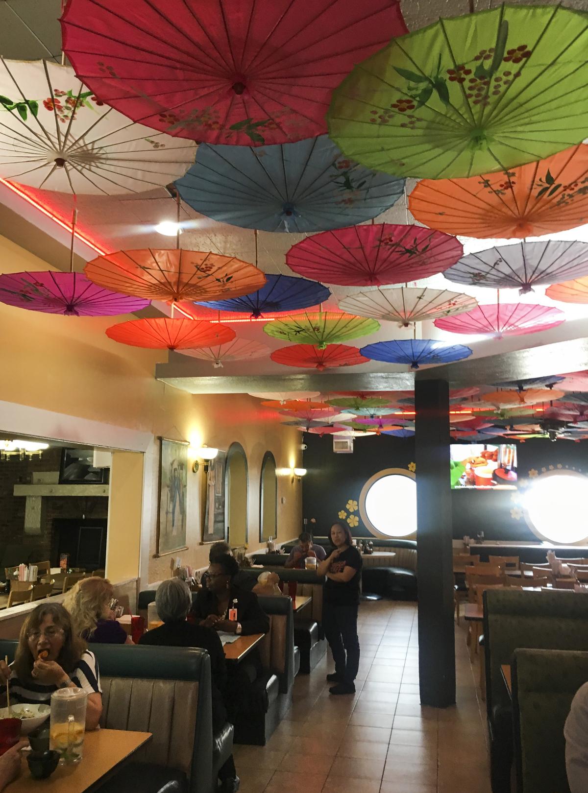 A ceiling of brightly hued parasols adds a cheery air to the atmosphere at Saigon Street Eat on Broadway in Sacramento, Calif..