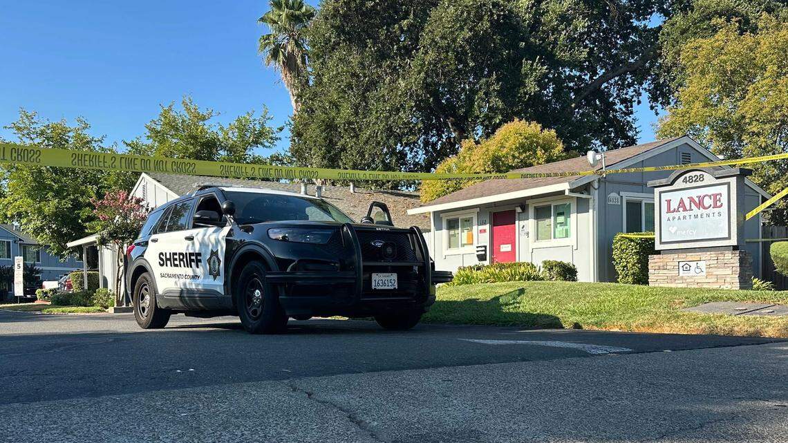 A Sacramento County sheriff's patrol vehicle is parked in front of the Lance Apartments on the 4800 block of El Camino Avenue in Carmichael following the discovery of three people who were shot to death Sunday, Aug. 31, 2025.