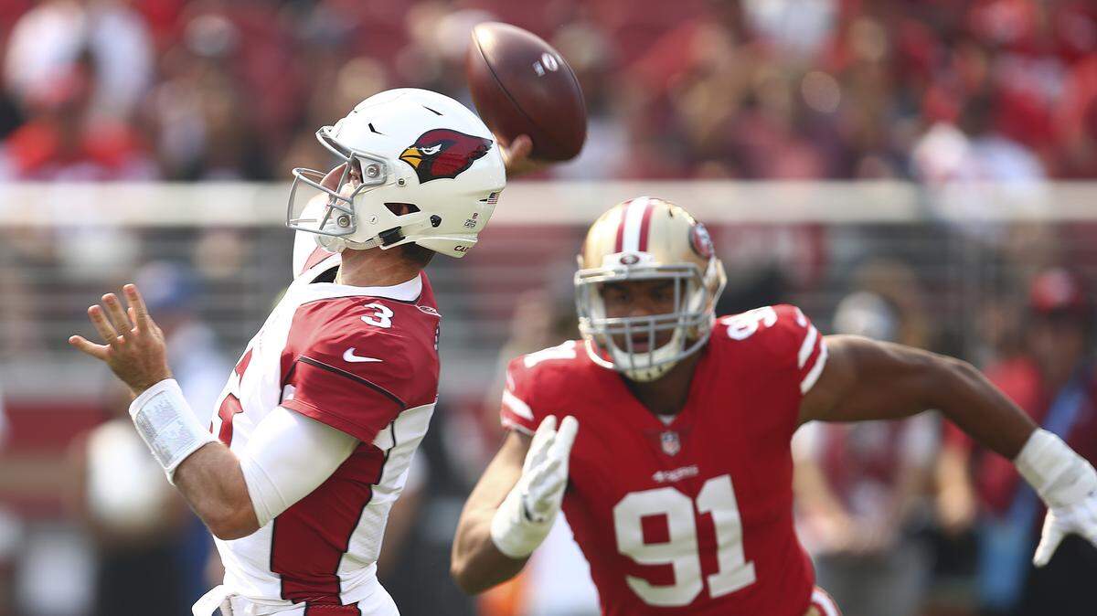 San Francisco 49ers defensive end Arik Armstead (91) closes in on Arizona Cardinals quarterback Josh Rosen (3) on Oct. 7 at Levi’s Stadium in Santa Clara. Coach Kyle Shanahan said Wednesday the 49ers will pick up Armstead’s fifth-year option.