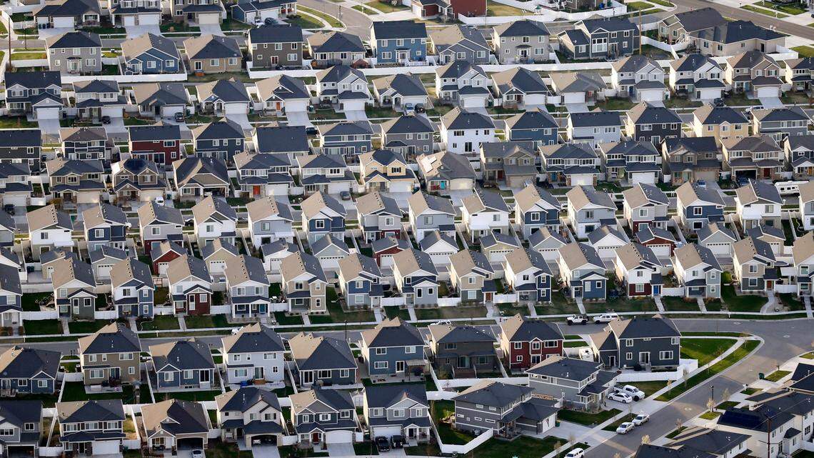 FILE - This April 13, 2019, file photo, shows rows of homes, in suburban Salt Lake City. On Thursday, June 6, Freddie Mac reports on this week’s average U.S. mortgage rates.
