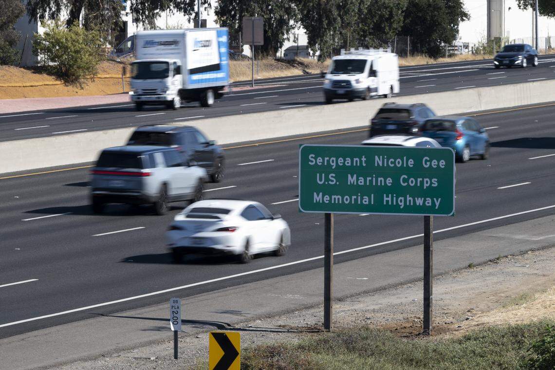 A highway sign designating a portion of Interstate 80 in Placer County as "Sergeant Nicole Gee U.S. Marine Corps Memorial Highway" is unveiled in Roseville on Wednesday. 