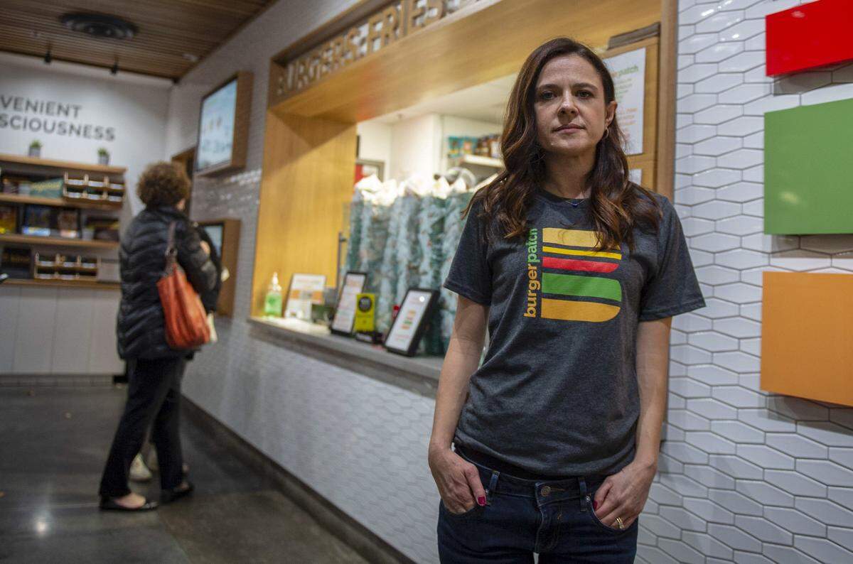 Burger Patch co-owner Danea Horn poses at her restaurant in 2019. Burger Patch is closing its final location on Labor Day.