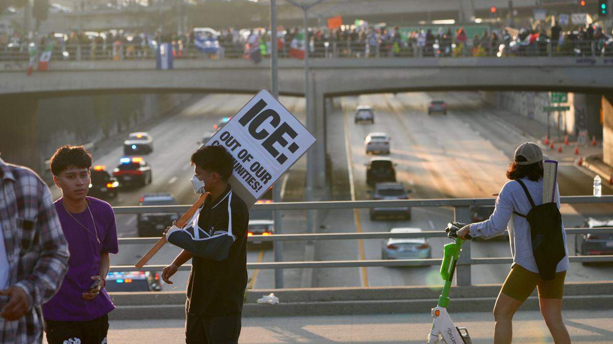 Protesters gather near Union Station and the Federal Courthouse in Los Angeles on Sunday, June 8, 2025. Clashes between law enforcement and protesters intensified on Sunday as California National Guard troops arrived in Los Angeles to quell demonstrations against President Donald Trump’s immigration crackdown, a move that the state’s Democratic governor has called unlawful.
