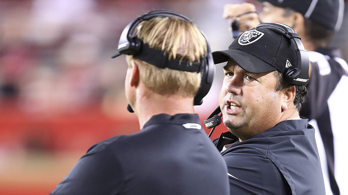 Raiders defensive coordinator Paul Guenther, right, talks with coach Jon Gruden during a loss to the 49ers on Nov. 1 in Santa Clara.