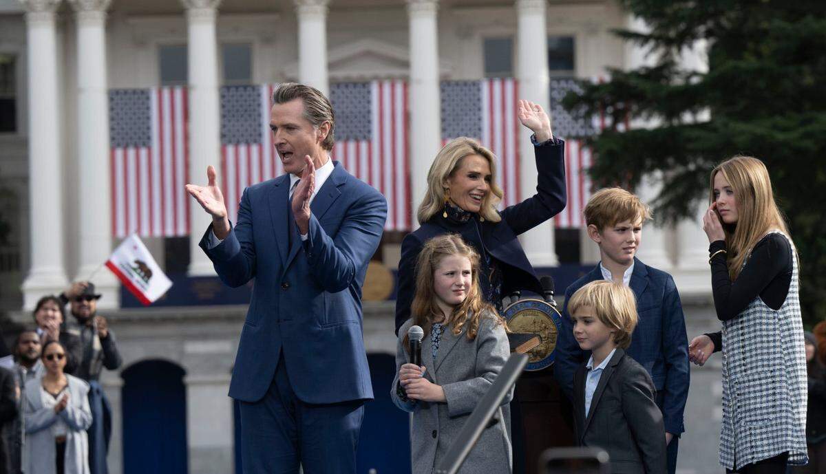 California Gov. Gavin Newsom celebrates his inauguration with first partner Jennifer Siebel Newsom, and their kids Brooklynn, 9, Dutch, 6, Hunter, 11, and Montana, 13, on Friday.