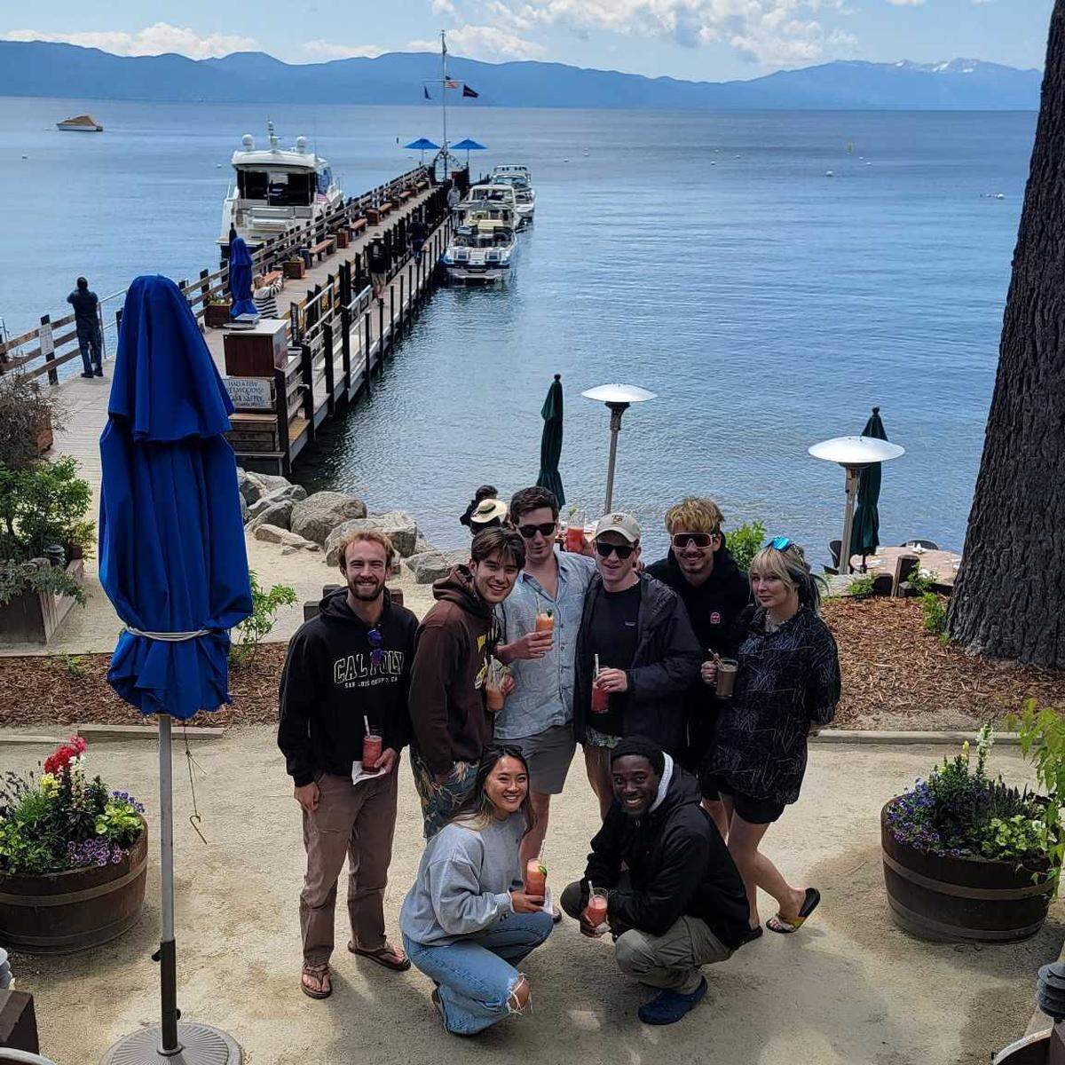Recent Cal Poly graduates pose before the June 21 storm on Lake Tahoe. The group was thrown into the water when their boat capsized while being towed to Tahoe Keys Marina.
