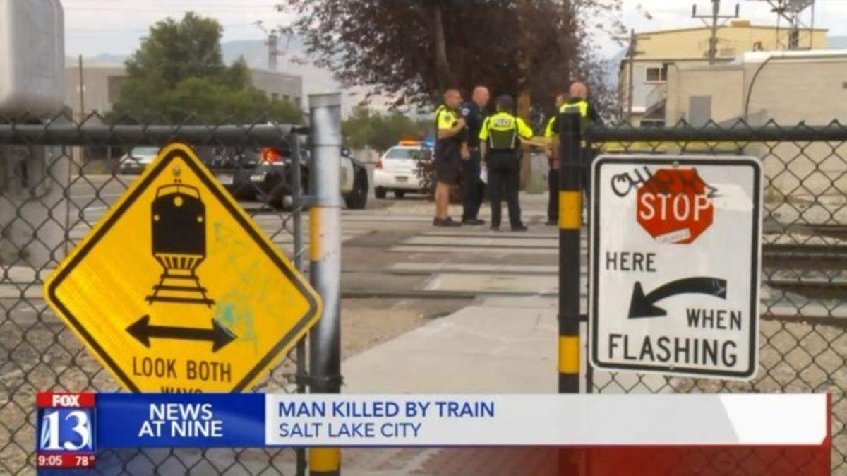 A man impatient to cross Salt Lake City railroad tracks died Saturday when he tried to roll under a passing freight train “like in the movies,” police say. He was caught up in the train wheels.