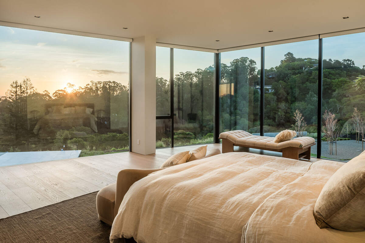 The primary suite is conceived as a five-star retreat, enveloped in full slab marble with a steam shower and integrated smart amenities