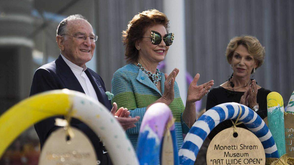 Maria Manetti Shrem, center; Jan Shrem, left, and Carol Parker celebrate the opening of the Jan Shrem and Maria Manetti Shrem Museum of Art at UC Davis in 2016. This week, Manetti Shrem announced a posthumous donation of $20 million and an annual gift to fund arts education at the Davis university.