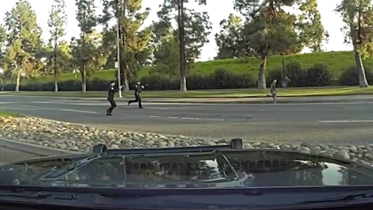 Sacramento police dash camera footage shows two officers pursuing a bank robbery suspect on Exposition Boulevard outside of Cal Expo in Sacramento, Calif., on Thursday, Jan. 29, 2026. The encounter ended in a fatal officer-involved shooting of the suspect, identified as a 56-year-old man.