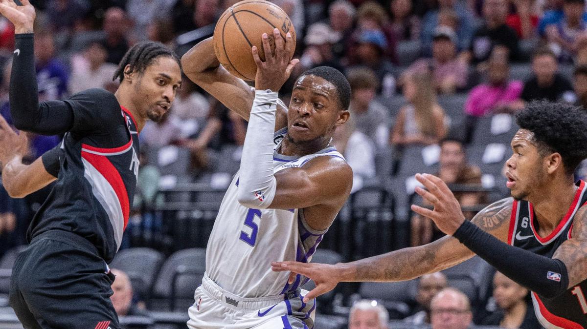 Sacramento Kings guard De’Aaron Fox (5) prepares to make a pass against the Portland Trail Blazers on Sunday, Oct. 9, 2021 during an exhibition NBA basketball game at Golden 1 Center in Sacramento.
