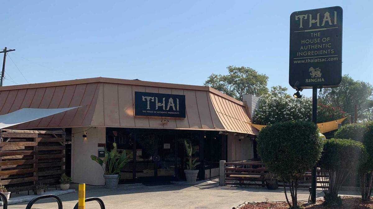 A closure sign is posted on the front door of T.H.A.I - The House of Authentic Ingredients at 4701 H St. in East Sacramento. The restaurant was shut down after failed inspections revealed a cockroach infestation.