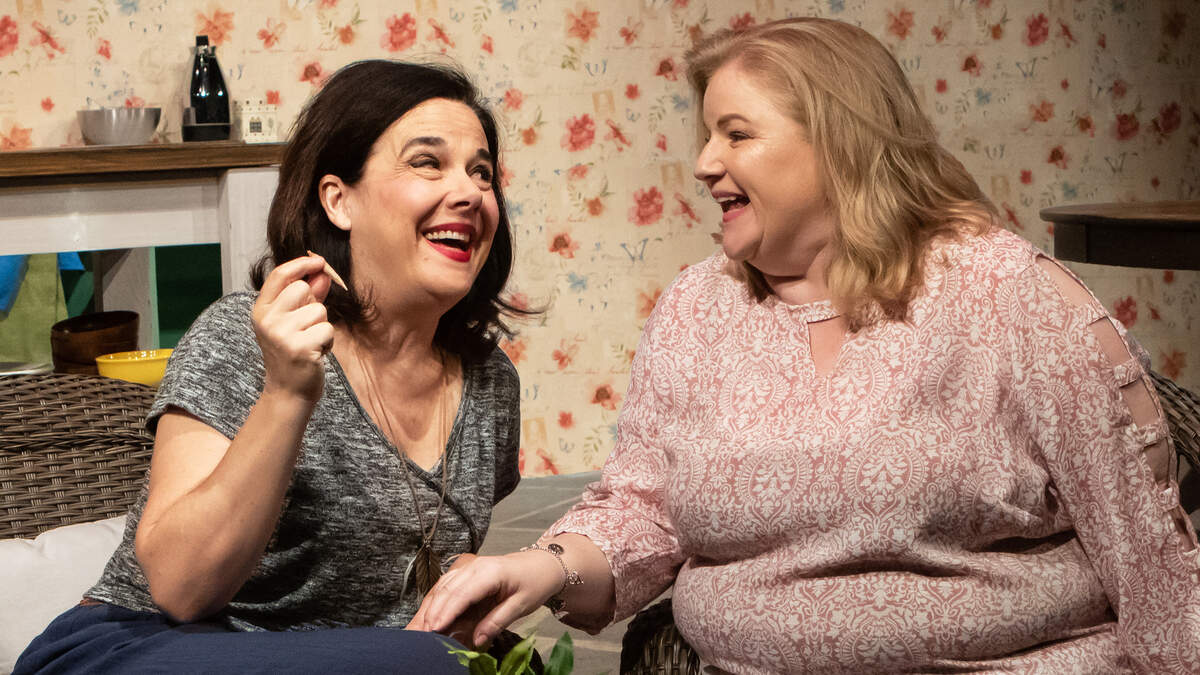 Actors Jamie Jones, left, and Laura Jane Bailey star in “The Roommate” at the Capital Stage.