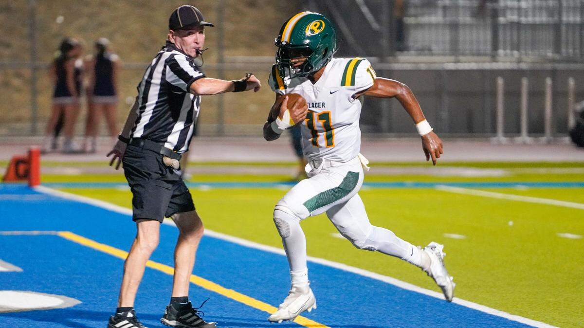 Placer running back Baylor Kelley (11) rushed for 81 yards and had a 23-yard touchdown burst in the second quarter in a 21-18 win over Vista del Lago