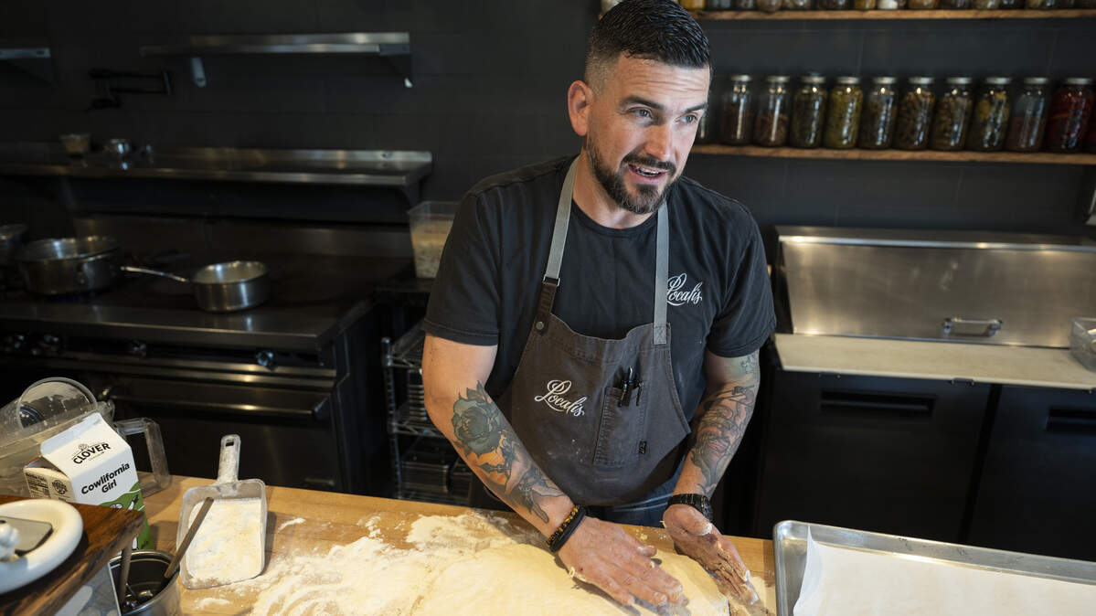 Owner Chris Barnum-Dann makes biscuits in preparation for Localis’ return of brunch service in Sacramento on Sunday, Feb. 22, 2026. He faces allegations of fostering a toxic work environment. 