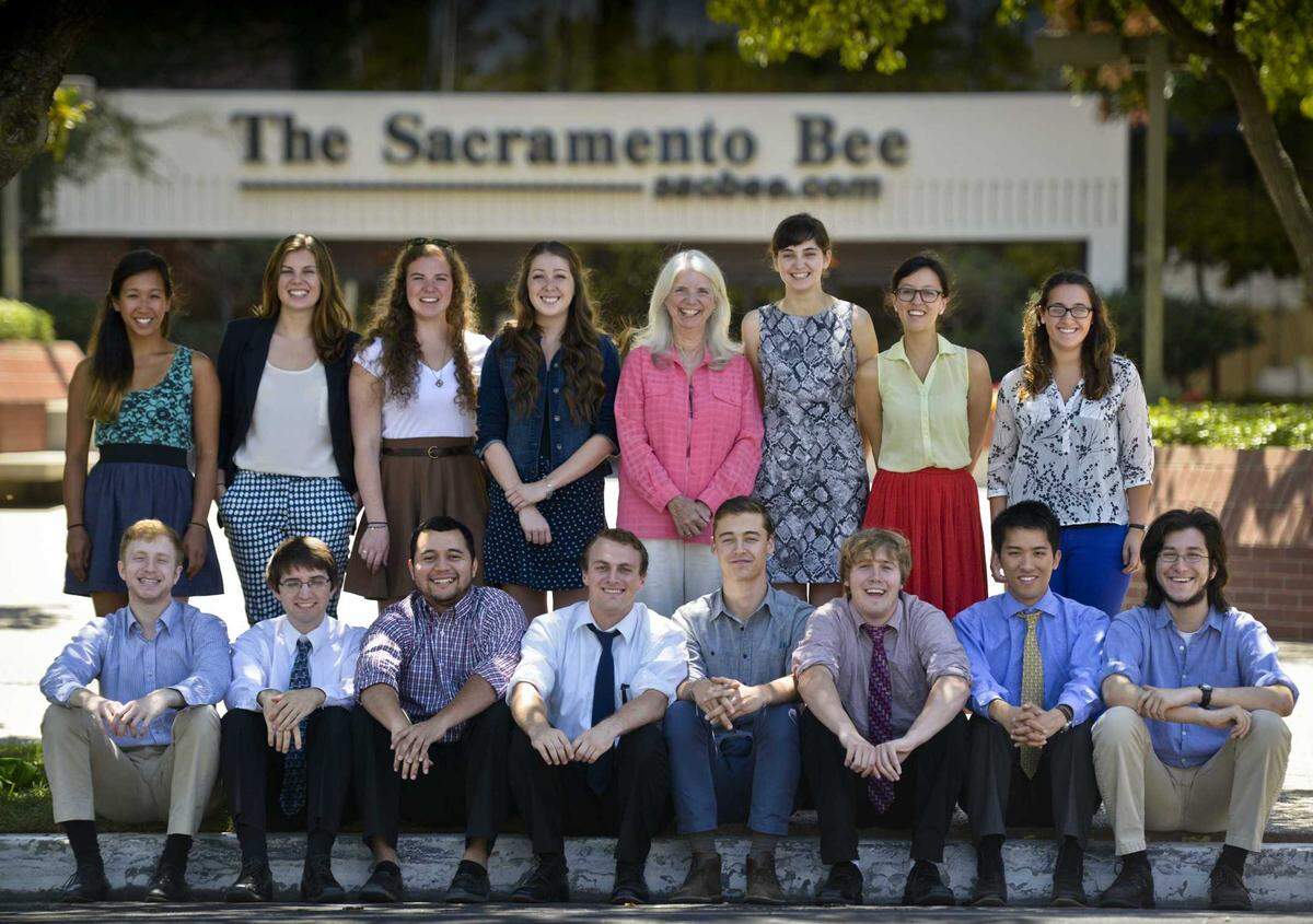 Sacramento Bee editor Janet Vitt surrounded by the newspaper’s interns for the summer of 2013 in front of the Sacramento Bee building. Vitt died Wednesday after battling cancer.