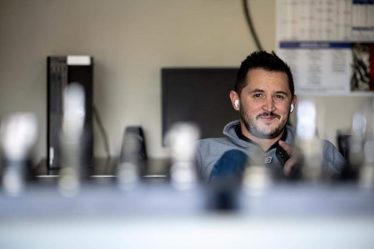 Taylor Budowich, then a senior advisor to the Trump Campaign, sits in a campaign office in October 2020 during a multi-state tour with Donald Trump Jr. just before Election Day.