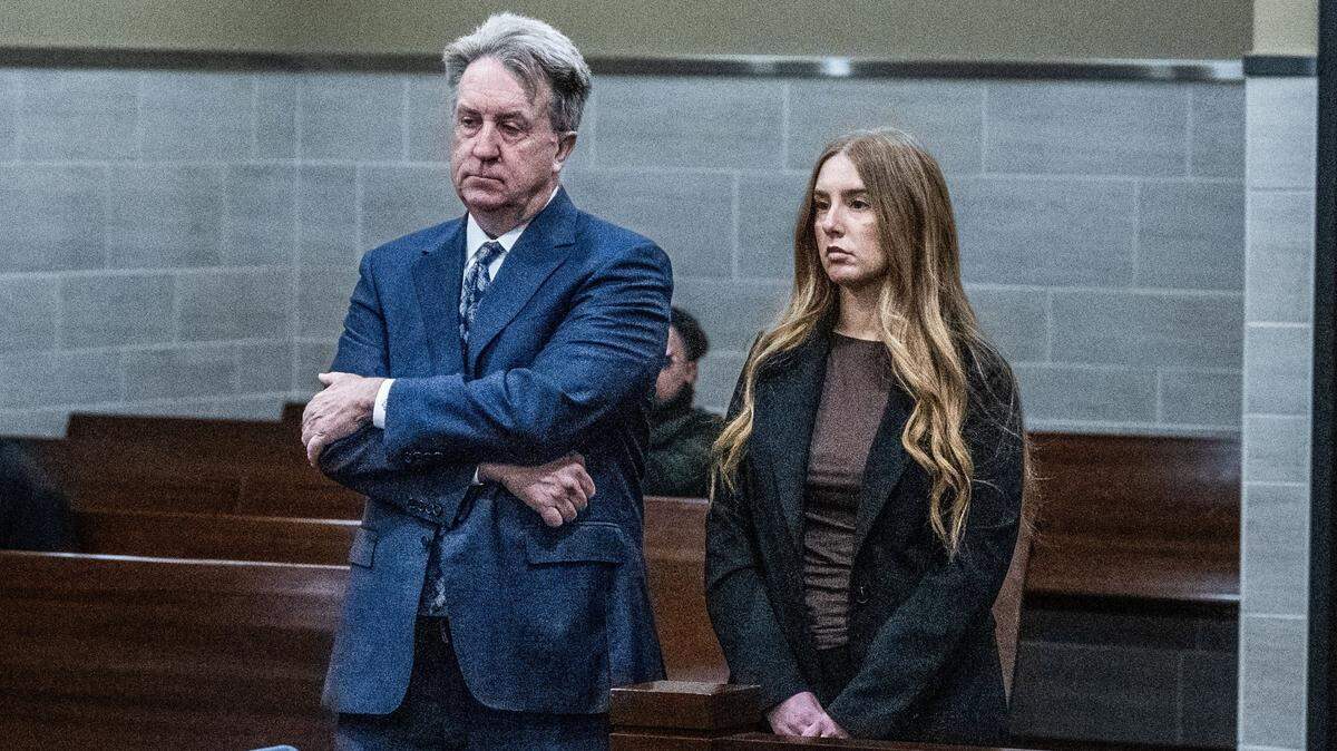 Meagan McFadden, the former UC Davis fire department chief’s executive assistant, attends her arraignment hearing with attorney Thomas Johnson on Tuesday at Yolo Superior Court. McFadden, 34, faces felony charges of misappropriating public money and embezzlement.