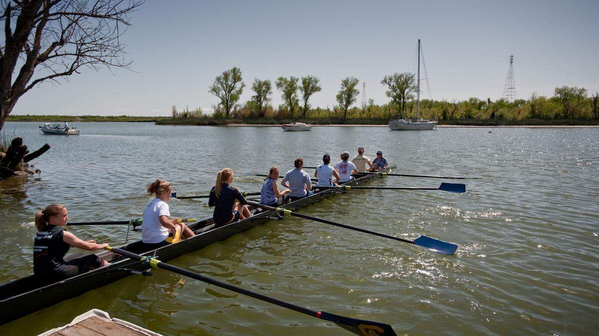 FILE -- UC Davis women's rowing team heads out in the waters in West Sacramento to practice in preparation for a regatta competition on April 16, 2010. The women's rowing team was cut in 2010, but is among viable options for teams UCD could add in 2018 to meet Title IX requirements and balance the university's ratio of female-to-male student-athletes.